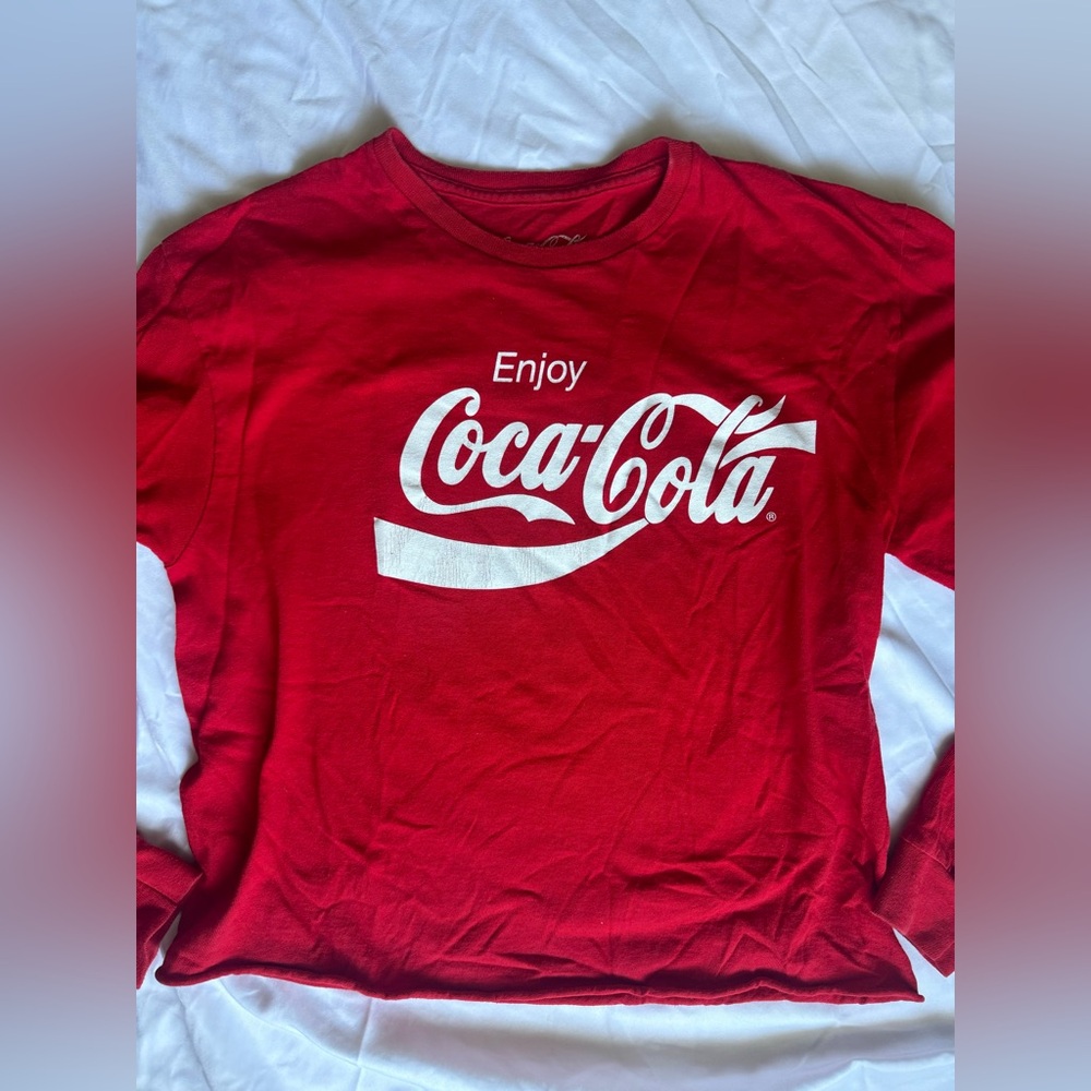 Red long sleeve Coca Cola T-shirt in size medium.